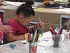 image of a child making art at a workshop